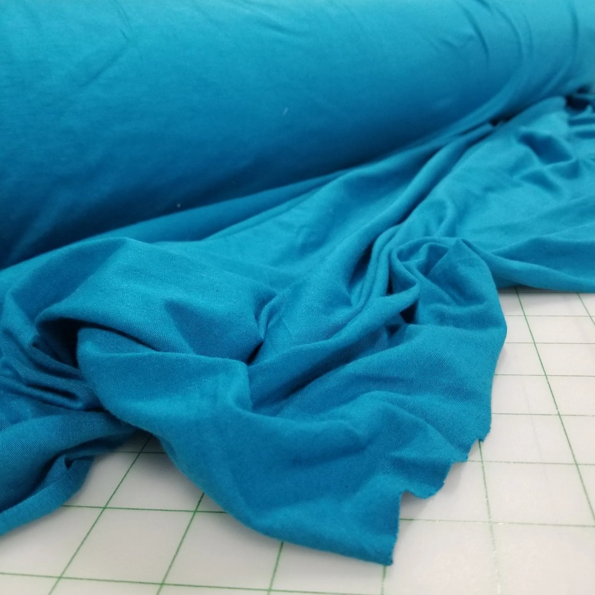 End of bolt : 2.5 yards of Designer Deadstock Rayon Wool  Stretch Jersey Turquoise Blue 5.5oz Knit- remnant
